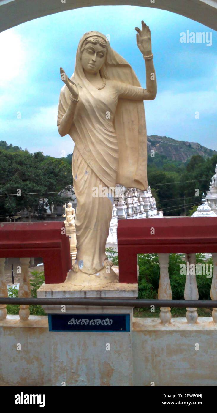 Statue of Mirabai. She was a 16th-century Hindu mystic poet and devotee of Krishna. Kannada text in the image translates to Mirabai Stock Photo