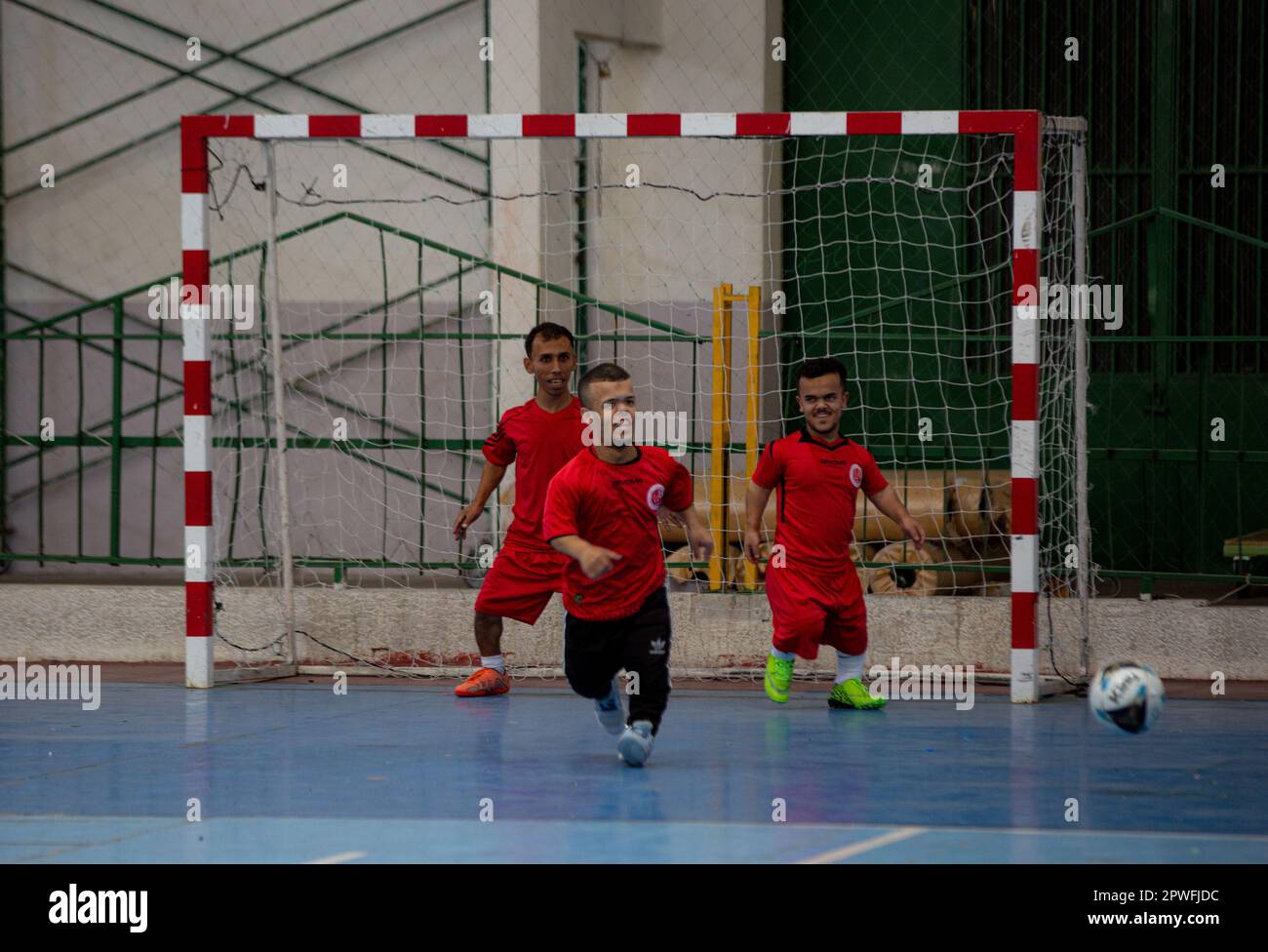 Gaza City, Gaza Strip, Palestine. 29th Apr, 2023. Gaza City, Palestine. 30 April 2023. A football team composed of players of short stature affected by skeletal dysplasia train and practice football in a gym in Gaza City. The team, which was recently set up in the Palestinian coastal enclave and is receiving intense training, is due to compete at international sports competitions (Credit Image: © Yousef Mohammed/IMAGESLIVE via ZUMA Press Wire) EDITORIAL USAGE ONLY! Not for Commercial USAGE! Stock Photo