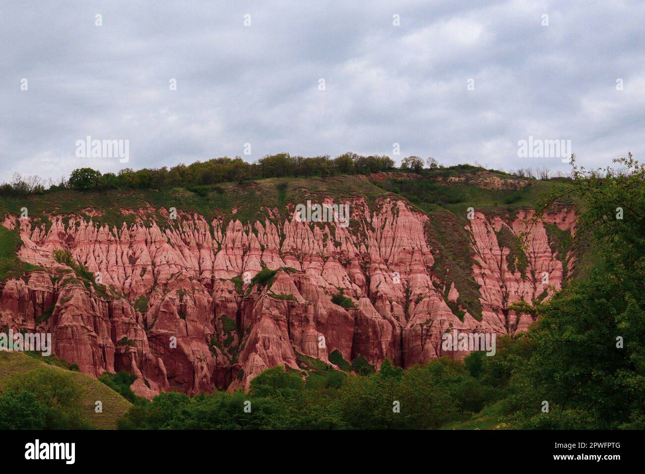 Red Desert Ravines Red Ravine in Sebes Alba caught from different angles during a rainy ...