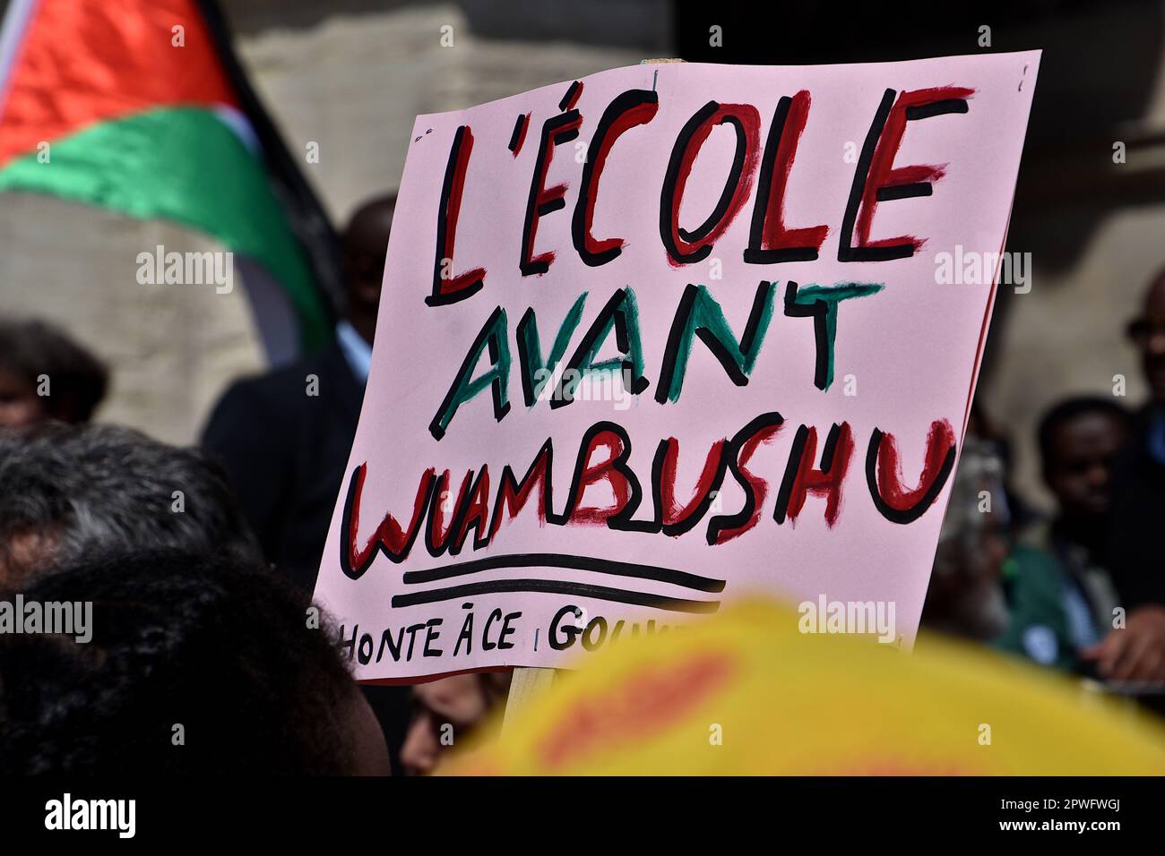 Marseille, France. 29th Apr, 2023. A protester holds a placard expressing opinion during the demonstration. Several people mostly the Comorian population, demonstrated in Marseille against the immigration law by the French government of Emmanuel Macron and supported by the Minister of Interior Gérald Darmanin, and against the 'Wuambushu' security operation in Mayotte. (Photo by Gerard Bottino/SOPA Images/Sipa USA) Credit: Sipa USA/Alamy Live News Stock Photo