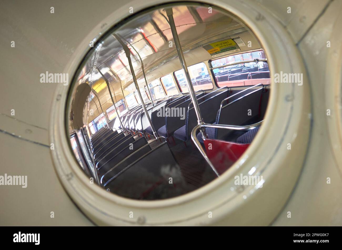 Reflection in convex mirror of old double deck bus Stock Photo Alamy