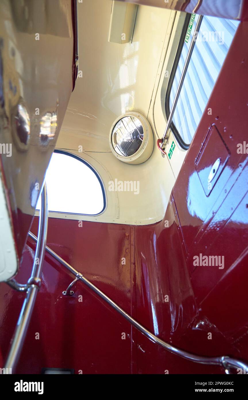 Reflection in convex mirror of old double deck bus Stock Photo Alamy