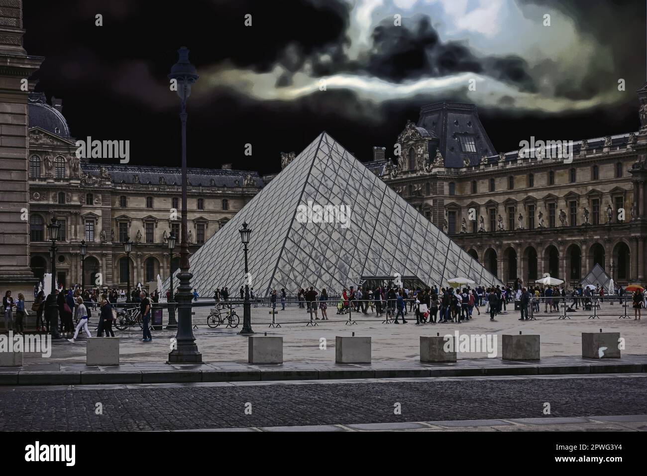 Louvre Pyramid in Paris, France Stock Photo
