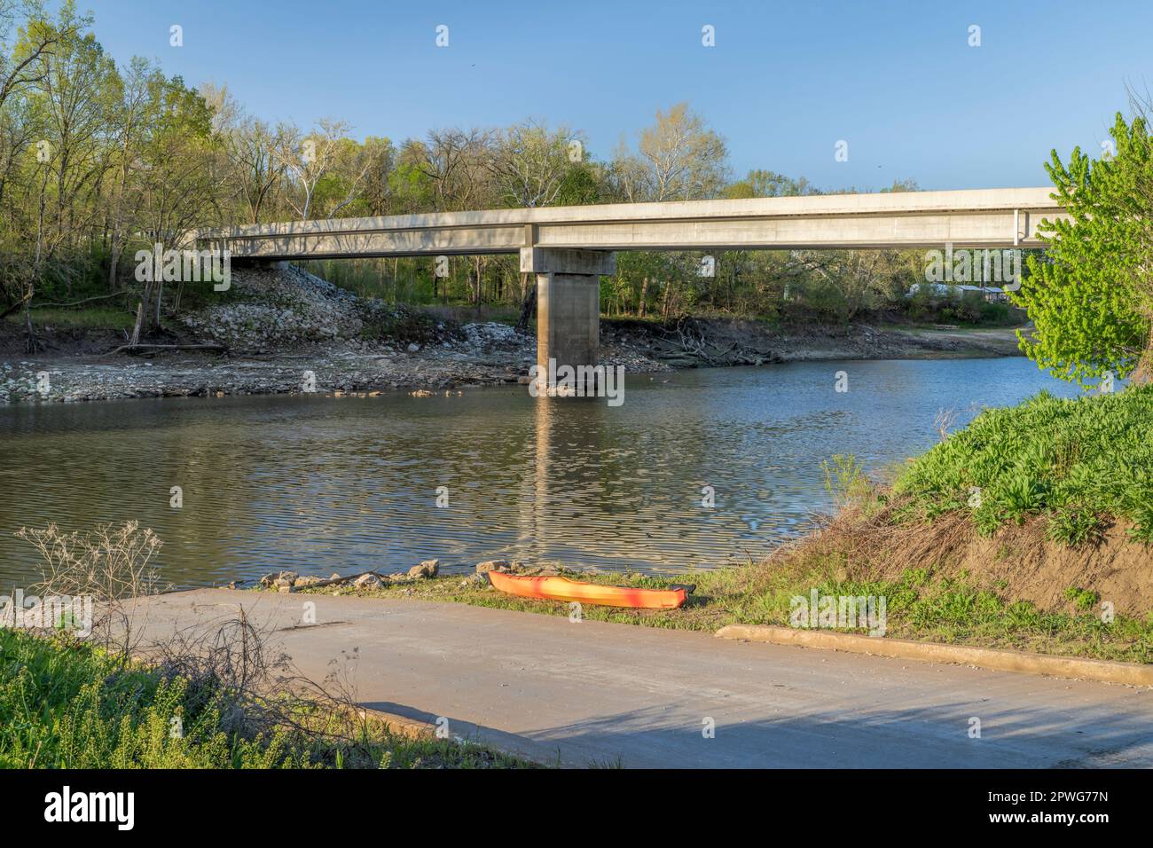 kayak on a boat ramp, Lamine River in early spring near Lamine, Missouri Stock Photo Alamy