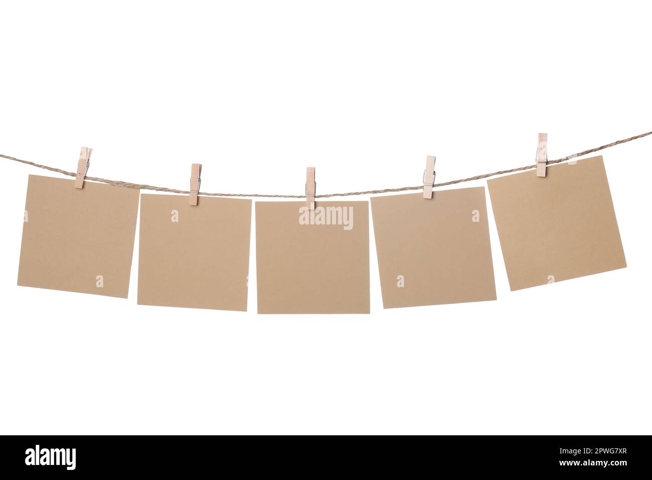 Clothespins with empty notepapers on string against white background. Space for text Stock Photo