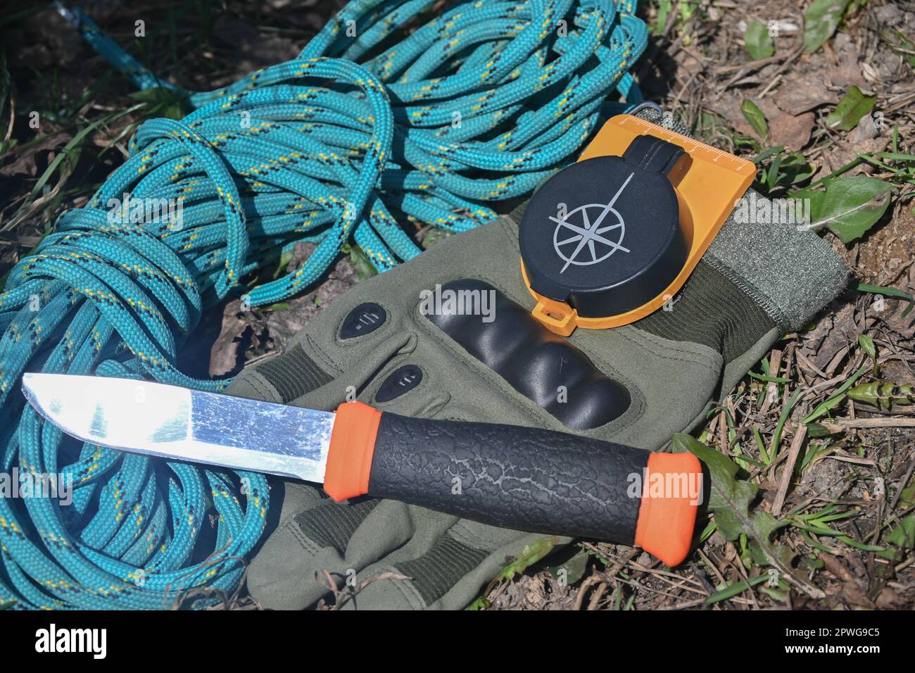 Survival Kit Army And Bushcraft Kit With Tin Mug Mug Candle Knife Paracord  Stock Photo - Download Image Now - iStock