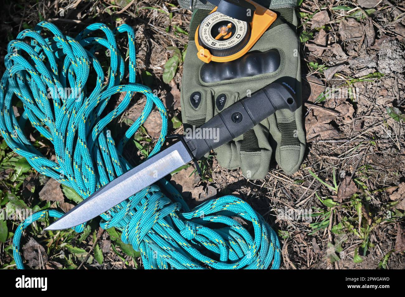 Survival Kit Army And Bushcraft Kit With Tin Mug Mug Candle Knife Paracord  Stock Photo - Download Image Now - iStock