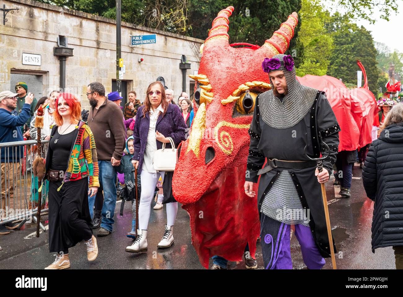 Glastonbury, UK. 30th April, 2023. Glastonbury’s streets packed with spectators as the Glastonbury Dragons make their way from the Abbey Abbots Kitchen Field and up the High Street towards the Fairfield. Credit: Stephen Bell/Alamy Live News Stock Photo