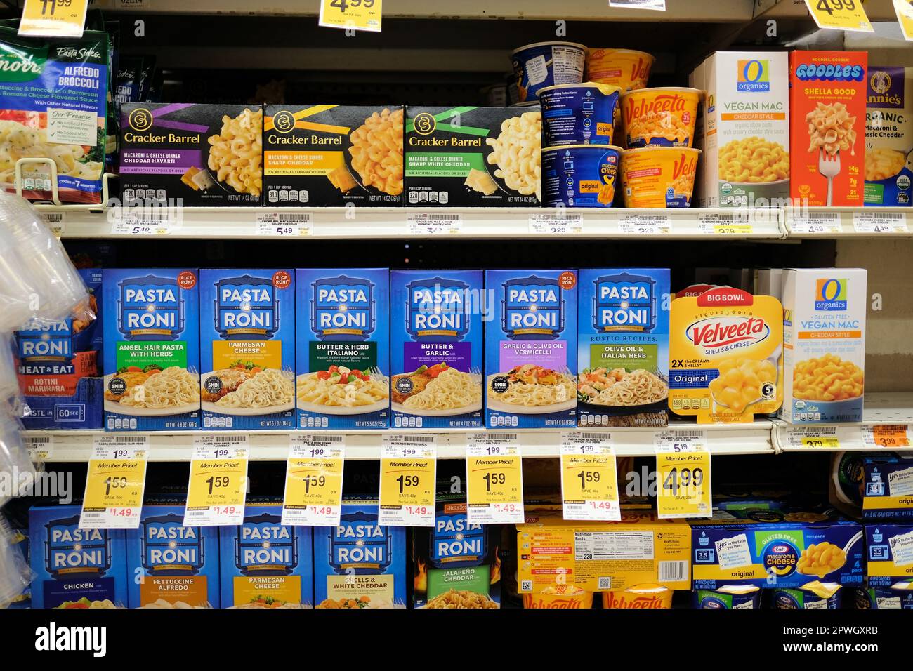 Shelves at a Safeway grocery store with boxes of Velveeta, Kraft, Pasta