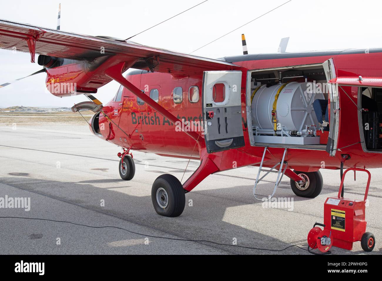 A British Antarctic Survey De Havilland Canada DHC-6 Twin Otter, VP-FBB, at Stanley Airport on The Falkland Islands. Long range fuel tanks fitted. Stock Photo