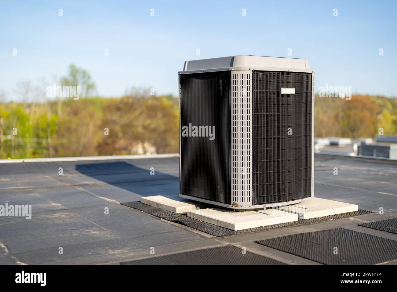 Photo of a roof exhaust ventilation fan on a new EPDM on a large