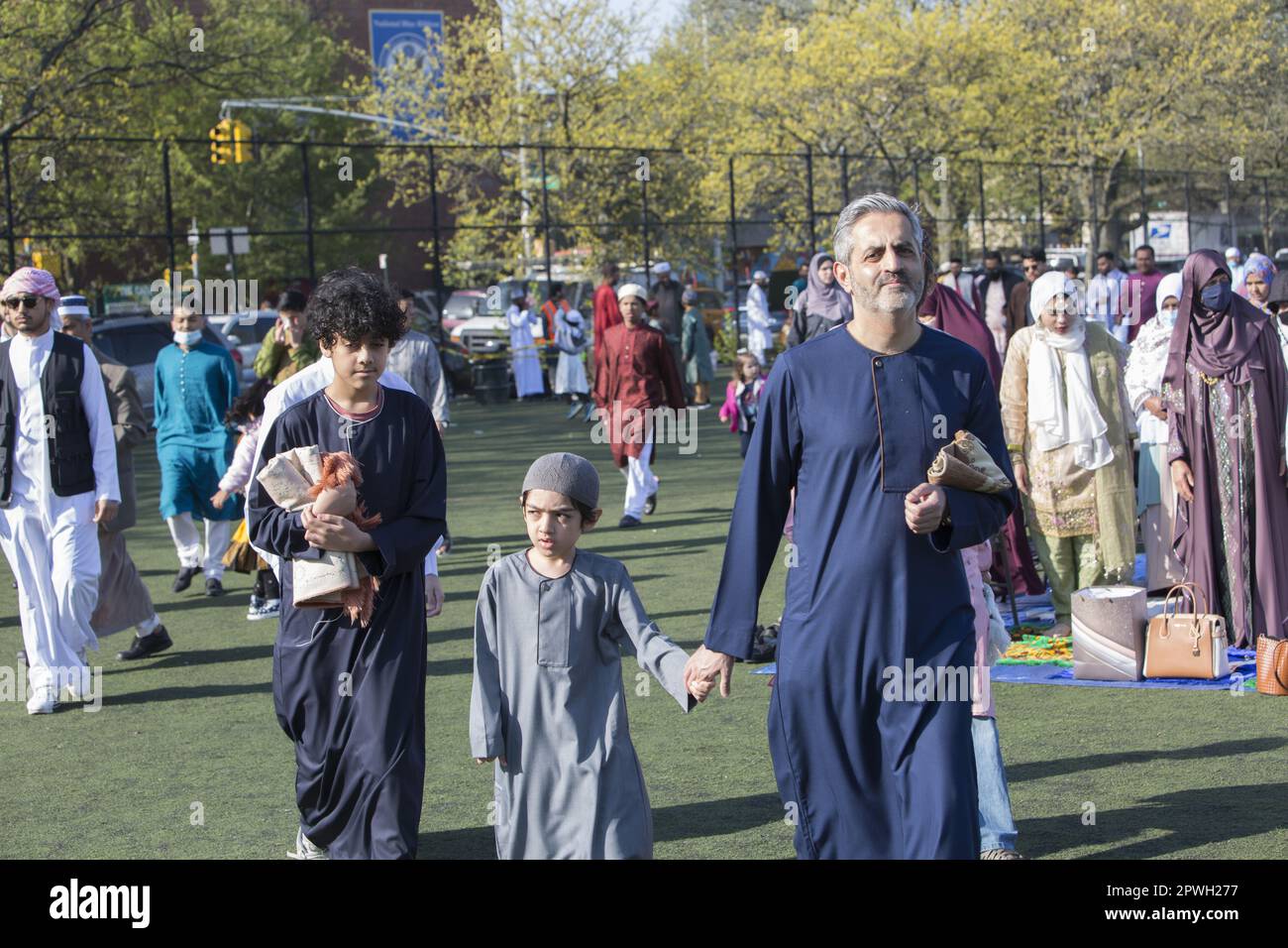 Muslims from various mosques in Brooklyn attend a prayer service on Eid at the end of Ramadan in Prospect Park, Brooklyn, New York. Stock Photo