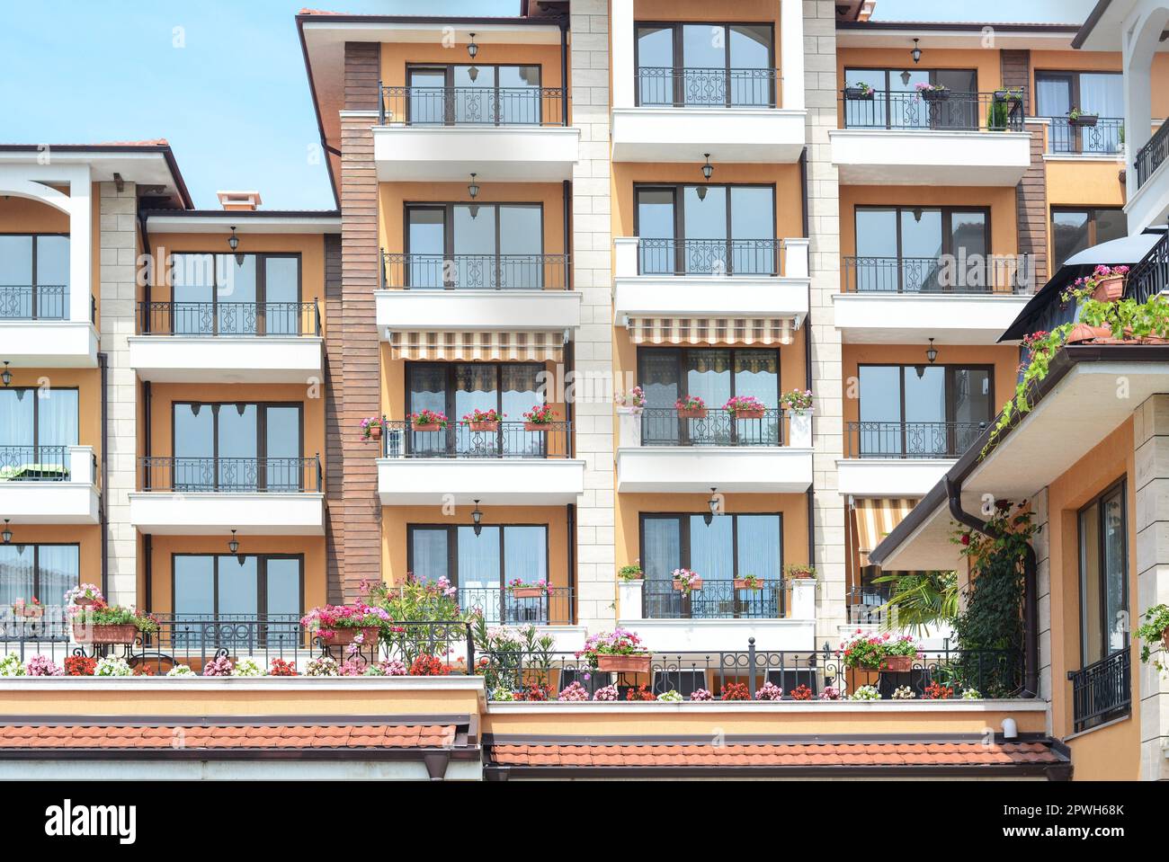 Exterior of residential building with balconies on sunny day Stock ...