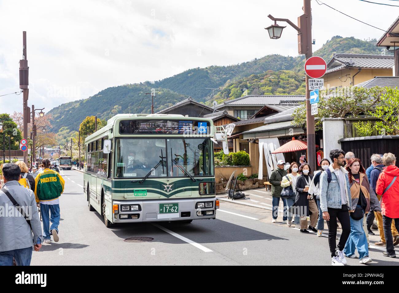 Arashiyama Kyoto, April 2023, public transport bus brings tourists visitors to Arashiyama to see bamboo grove and Tenryu-ji temple,Japan,Asia Stock Photo