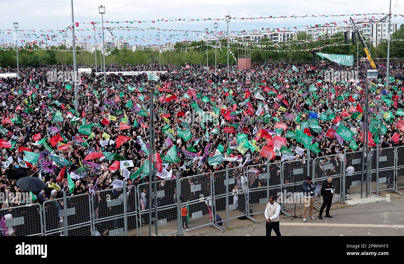 Participants of the birthday event of the Islamic Prophet Muhammad, held at Newroz Park are seen waving flags. The birth of the Islamic Prophet Muhammad was celebrated with an event organized by the Prophet Lovers Foundation in Newroz square in Diyarbakir and attended by thousands of people. Zekeriya Yapicioglu, the Chairman of the Islamic Kurdish party Free Cause Party (HUDA-PAR), as well as representatives of many parties and organizations from different Muslim countries, especially the representative of the Hamas organization from Palestine, also attended the celebration. (Photo by Mehmet M Stock Photo