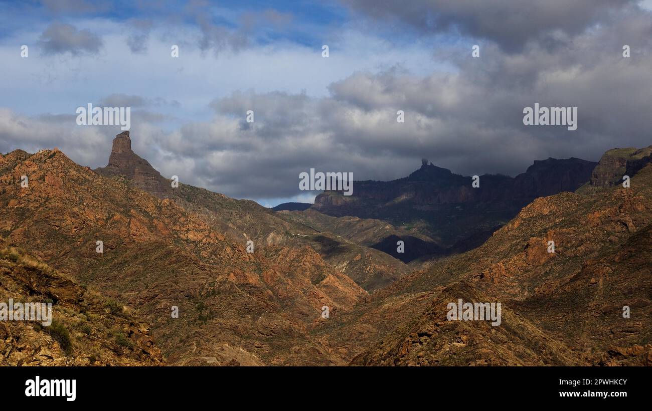 Massif Central, Roque Bentayga, Roque Nublo, mountain landscape, cloudy sky, Barranco de la Aldea, gorge, Gran Canaria, Canary Islands, Spain Stock Photo