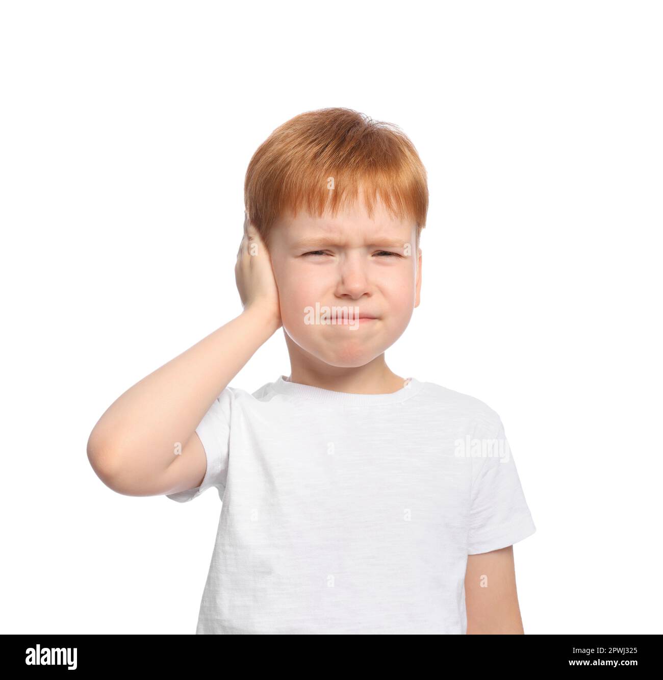 Little boy suffering from ear pain on white background Stock Photo Alamy