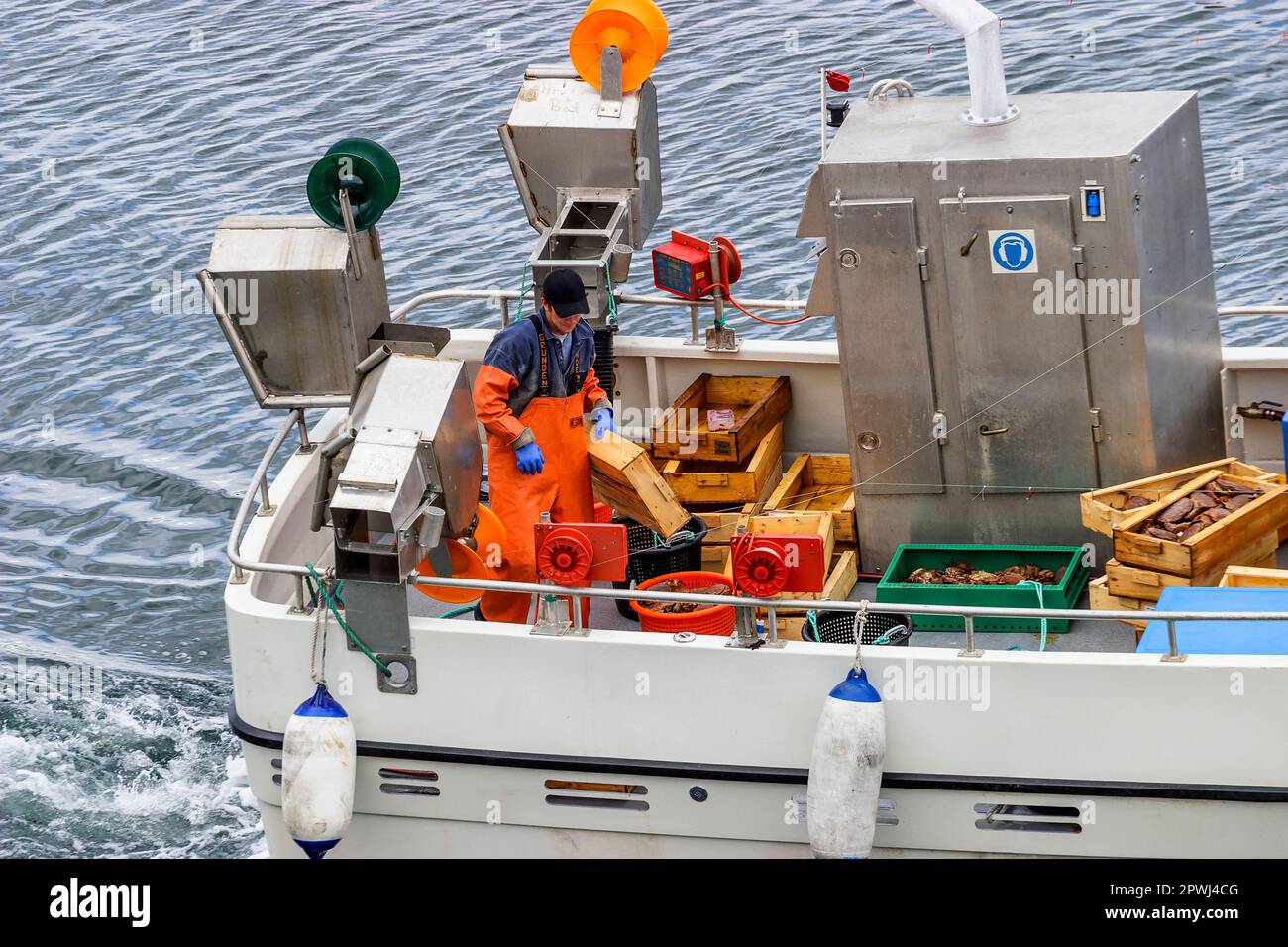 Crab fisherman on a boat Stock Photo Alamy