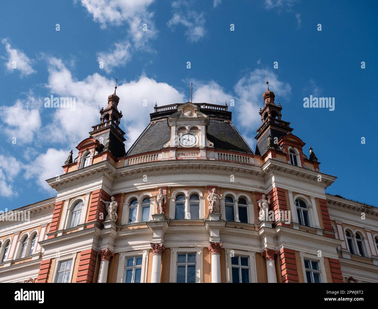 Old Main Post Office Building Exterior in Karlovy Vary, Czech Republic from the Austro Hungarian Empire with Four Allegorical Statues Representing Tel Stock Photo