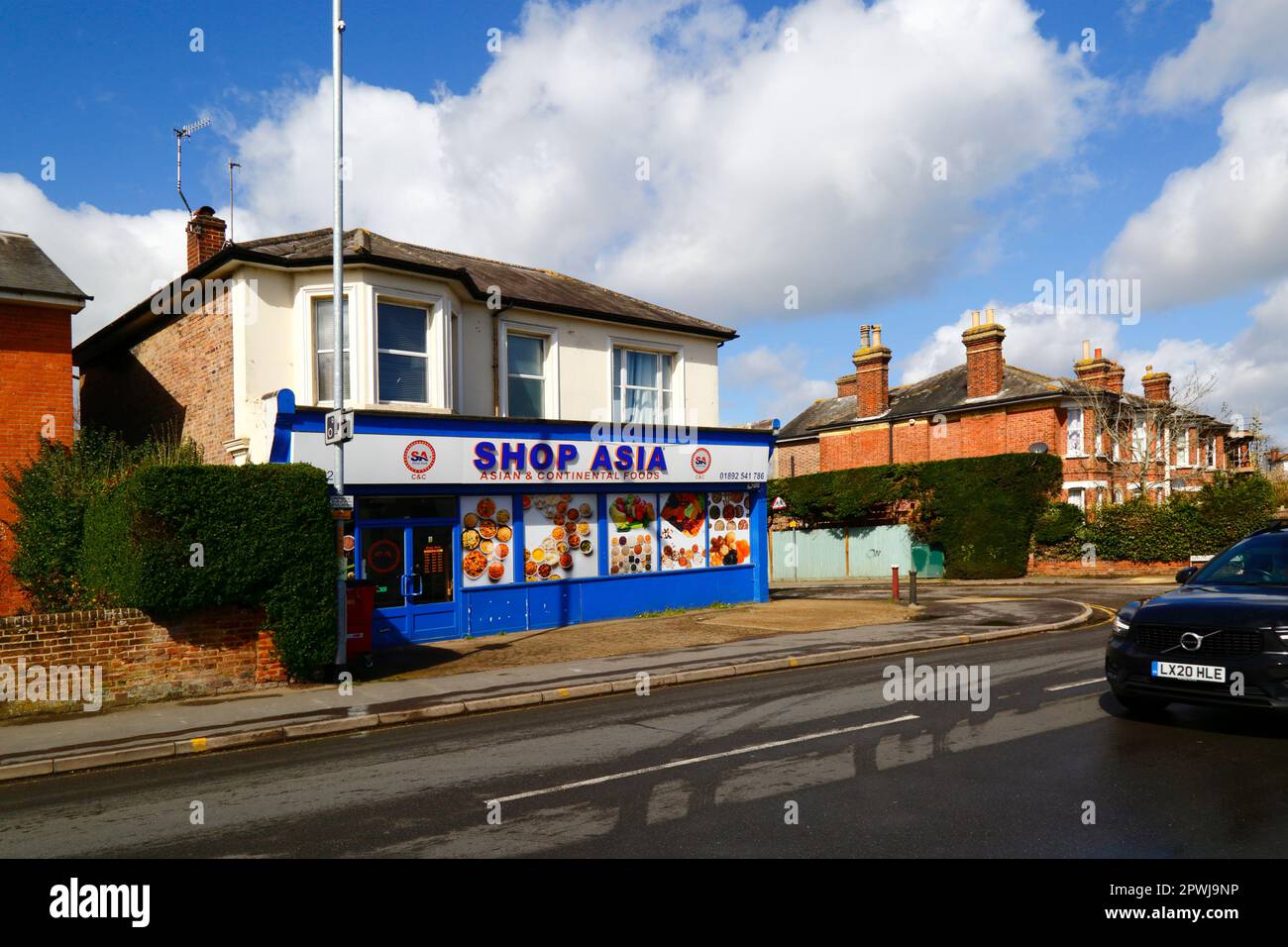 Asian and continental foods shop on corner of London and Springfield Roads, High Street, Southborough, Kent Stock Photo