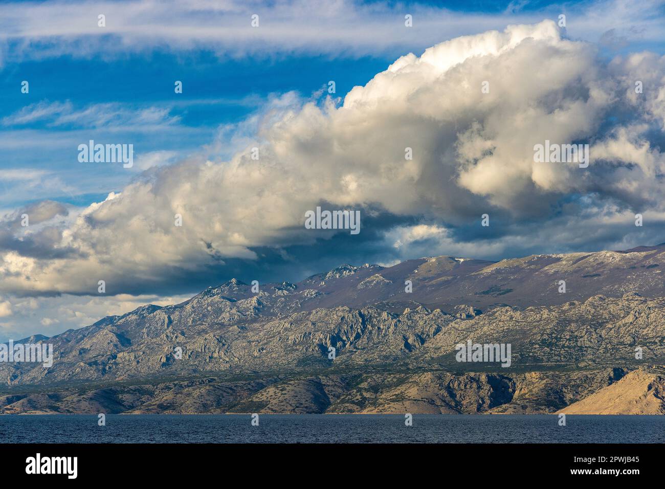 Clouds over Velebit mountain, seen from Pag, Croatia Stock Photo