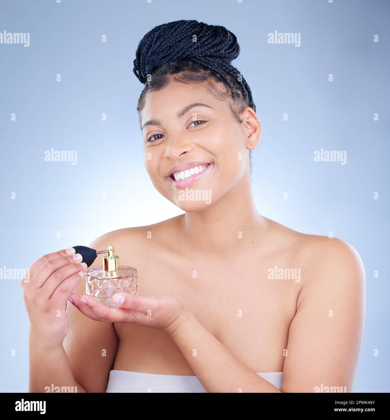 A rose should smell like it. Studio portrait of an attractive young