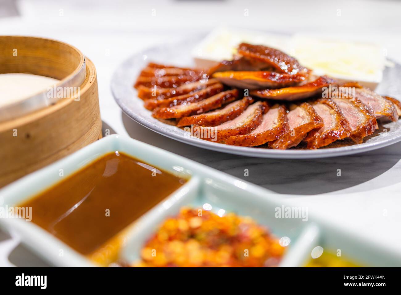 Roasted peking duck with sauce Stock Photo - Alamy