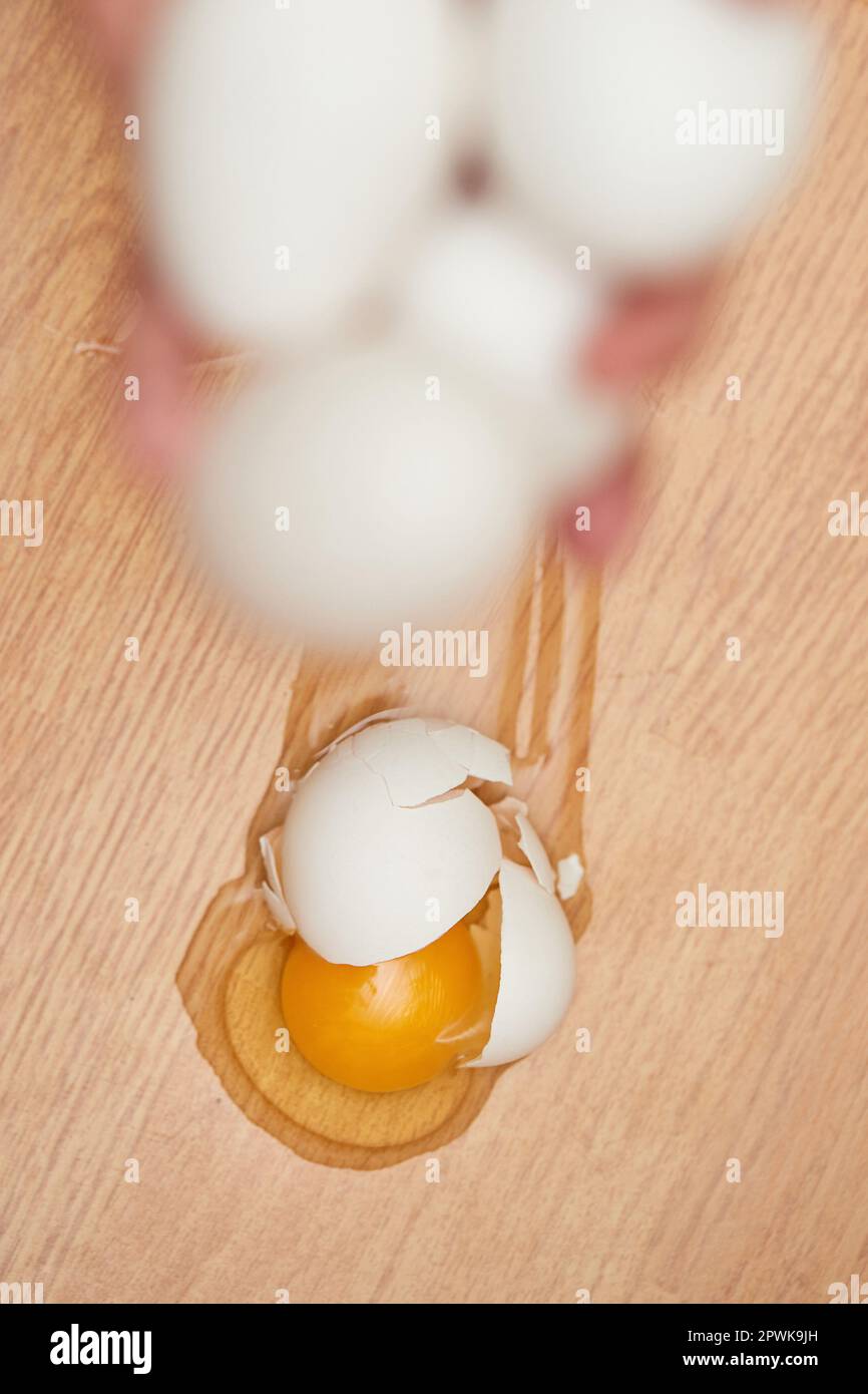 broken egg on the floor in kitchen, top view Stock Photo