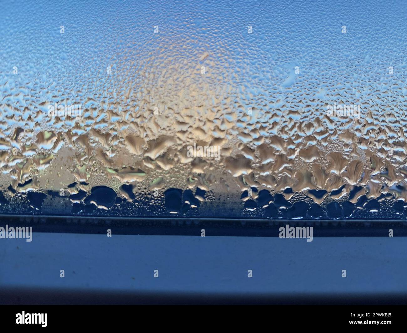 Window covered with frozen drops of the condensate water Stock Photo Alamy