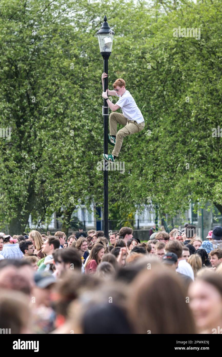 Jesus Green, Cambridge, 30th April 2023 A lad climbed a lamppost as
