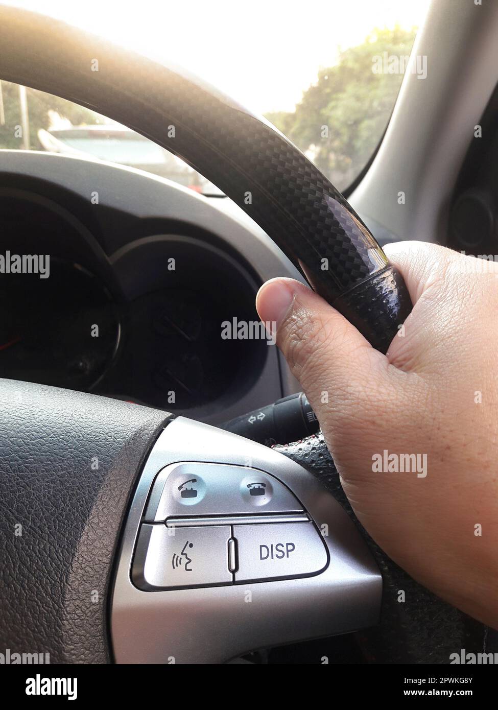 Turn the steering wheel while driving with warm light vintage. Car