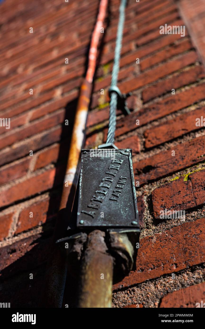 Lightning rod cable on the facade of a brick building Stock Photo Alamy