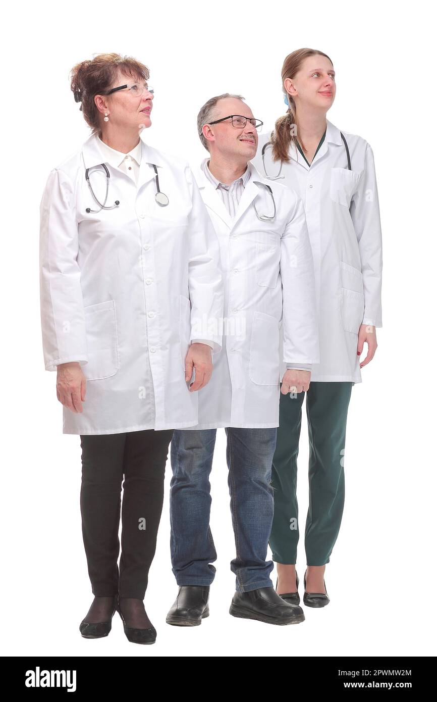 Team of doctors standing arms crossed and smiling at camera Stock Photo