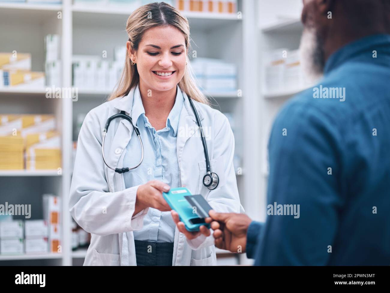 Payment, credit card or patient with pharmacist at pharmacy for prescription medicine or medical treatment. Shopping, insurance or happy doctor helpin Stock Photo