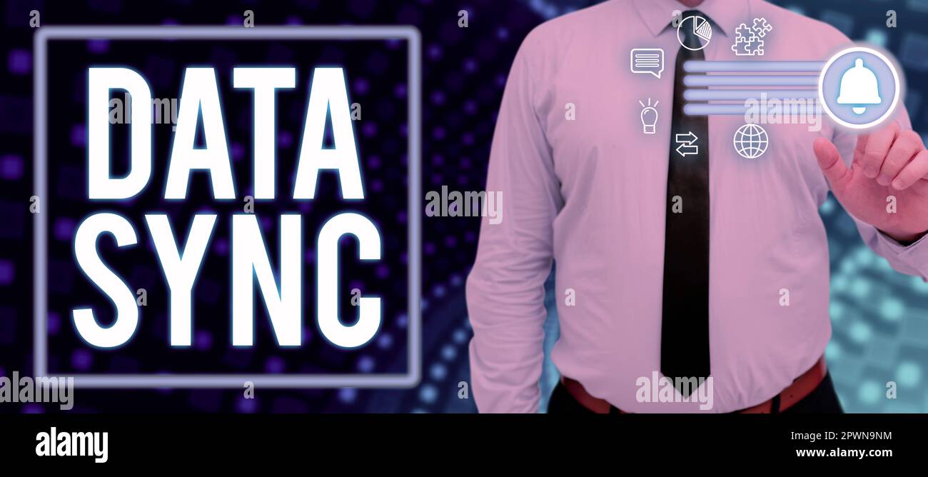 Writing displaying text Data Sync, Word Written on data that is continuously generated by different sources Stock Photo
