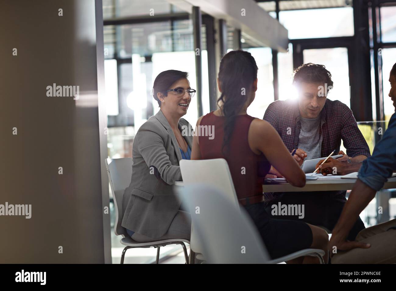 The table of ideas. a group of colleagues meeting in the office Stock