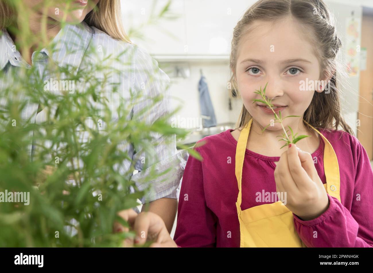 Child smelling food in pot hi-res stock photography and images - Alamy