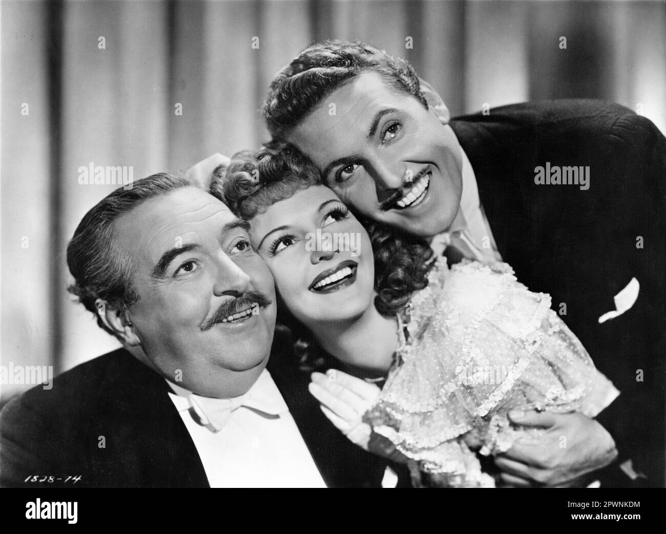 WALTER CONNOLLY as Victor Herbert MARY MARTIN and ALLAN JONES Portrait in THE GREAT VICTOR HERBERT 1939 director ANDREW L. STONE costume design Edith Head Paramount Pictures Stock Photo