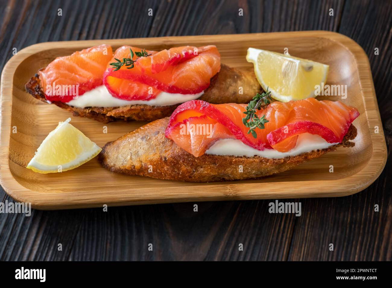 Salmon gravlax sandwich with sour cream and lemon Stock Photo Alamy