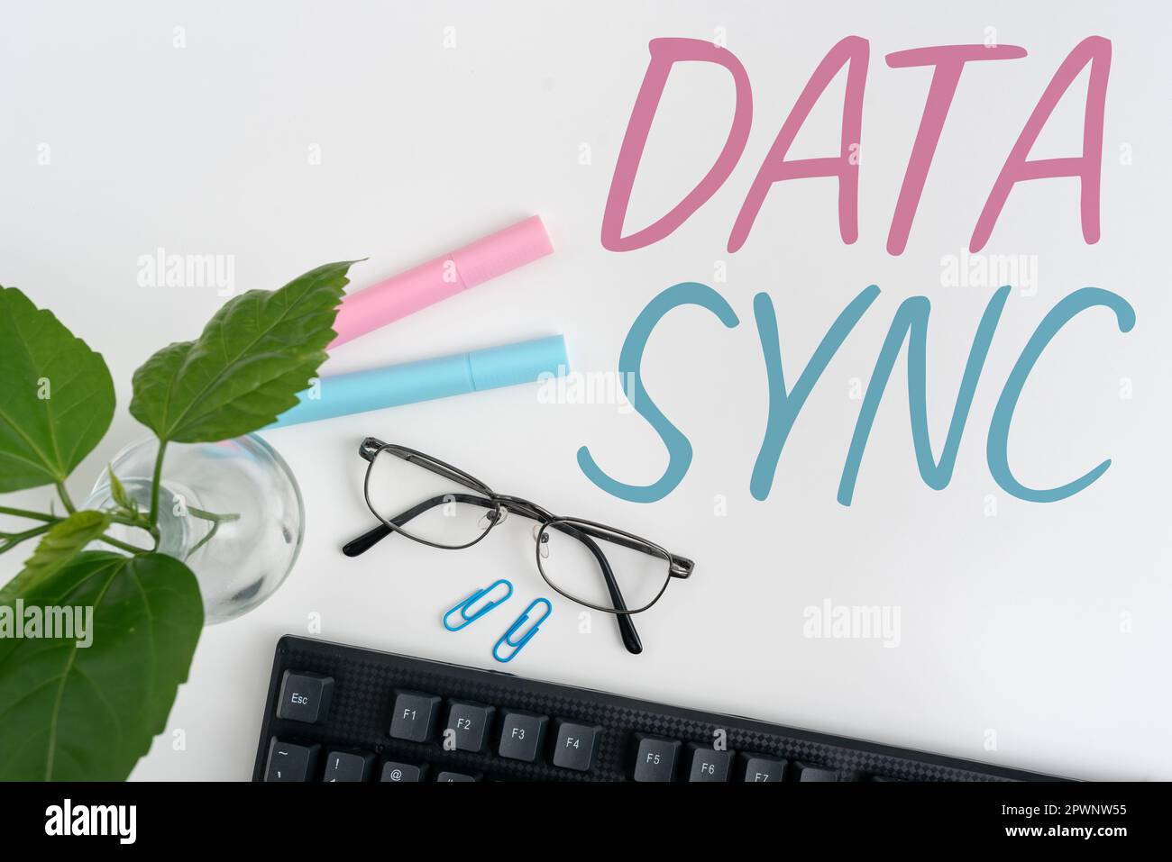 Handwriting text Data Sync, Business concept data that is continuously generated by different sources Stock Photo