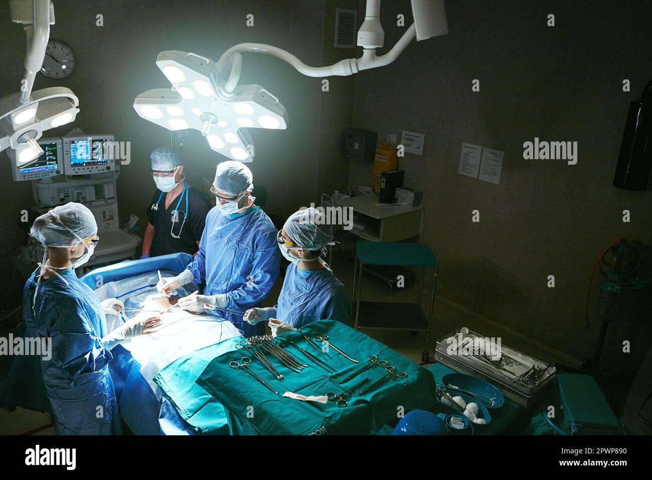 Surgery saves lives. surgeons in an operating room Stock Photo - Alamy