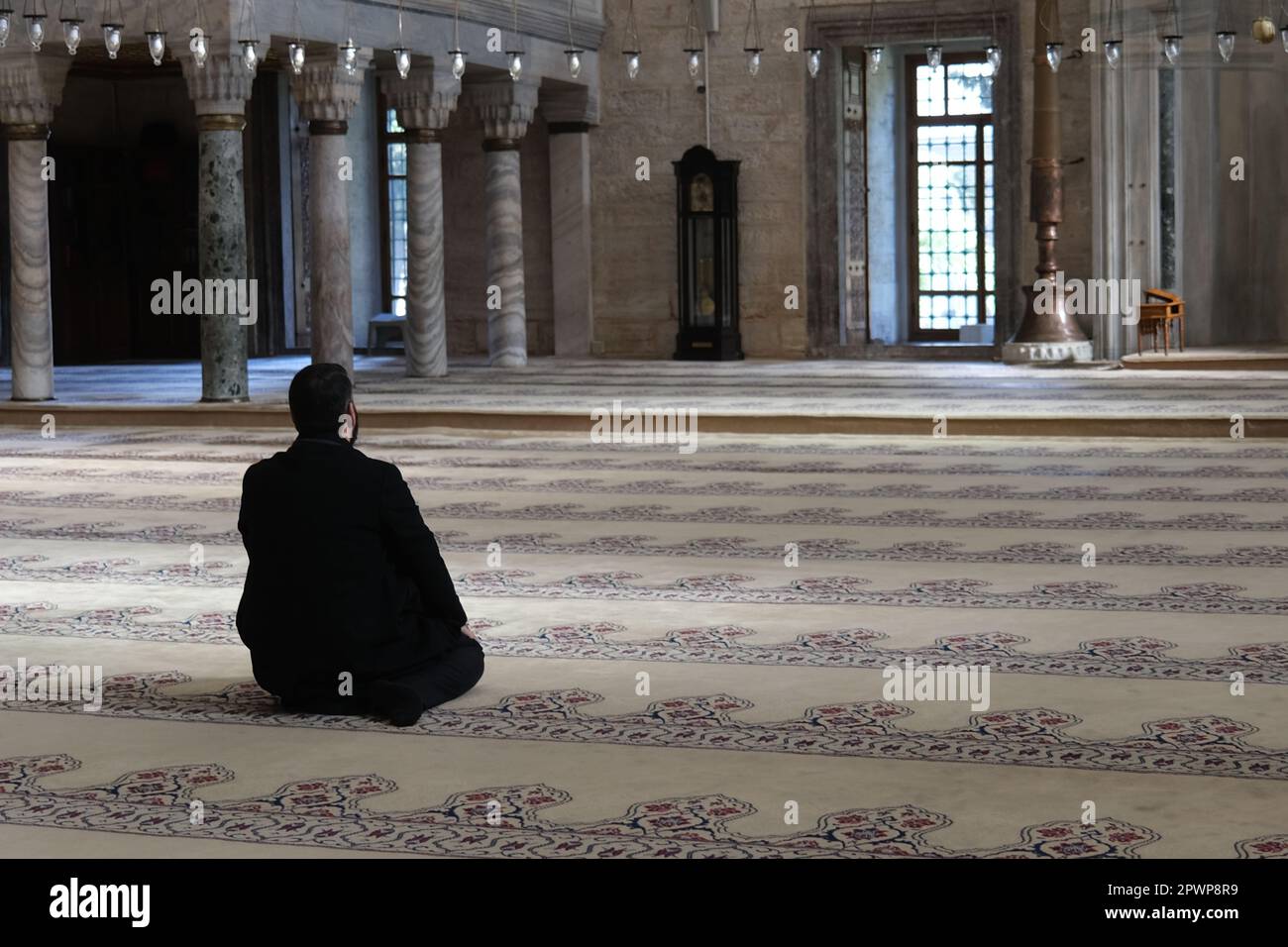 Man prays on his knees hi-res stock photography and images - Alamy