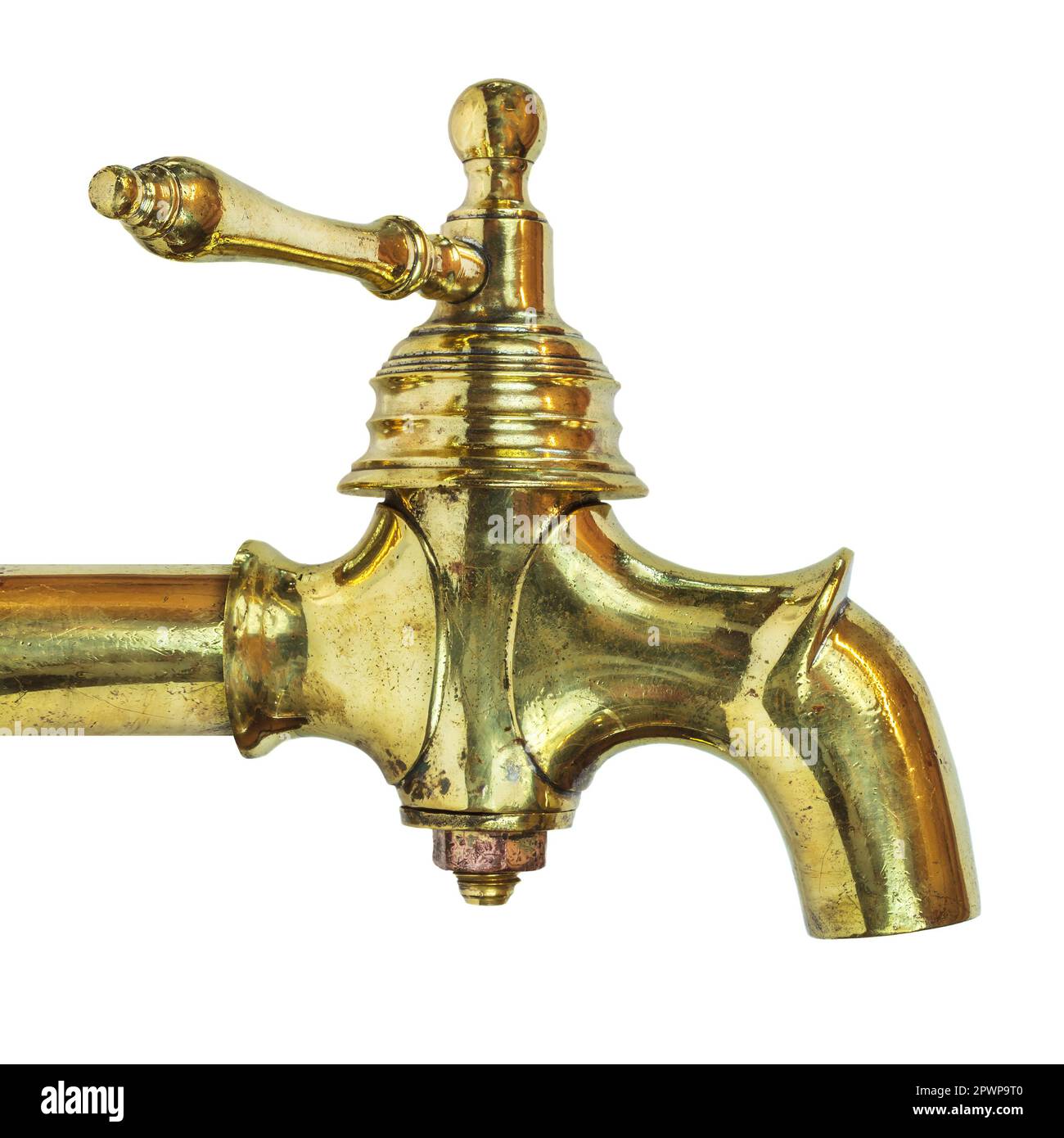 Side view of an ancient brass ornamental water tap isolated on a white background Stock Photo