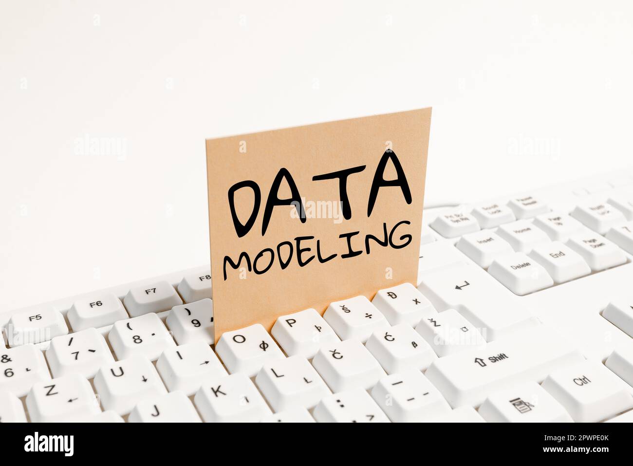 Sign displaying Data Modeling, Word for process of transferring data between data storage systems Stock Photo
