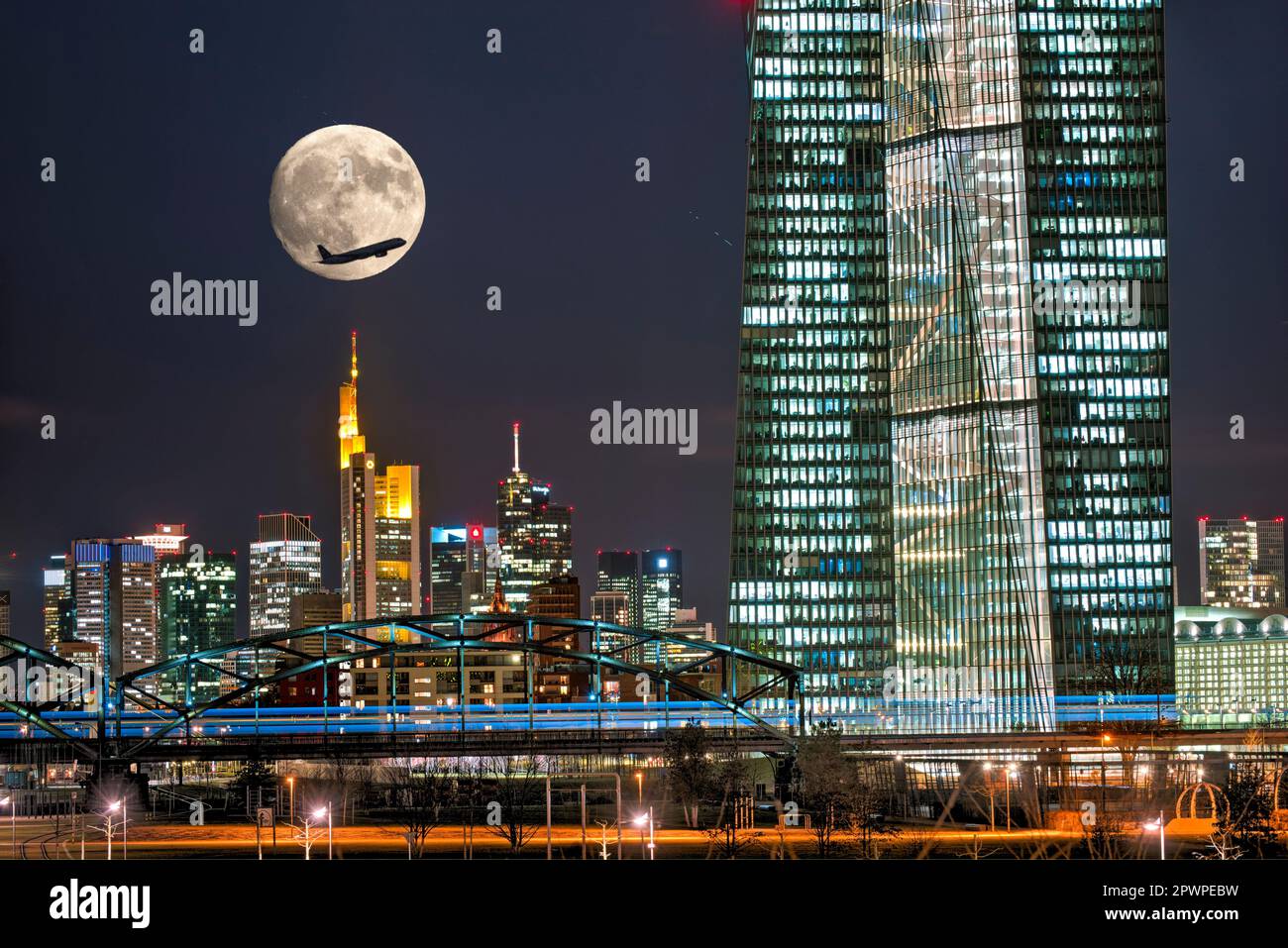 Skyline of Frankfurt am Main at night with the building of the European ...