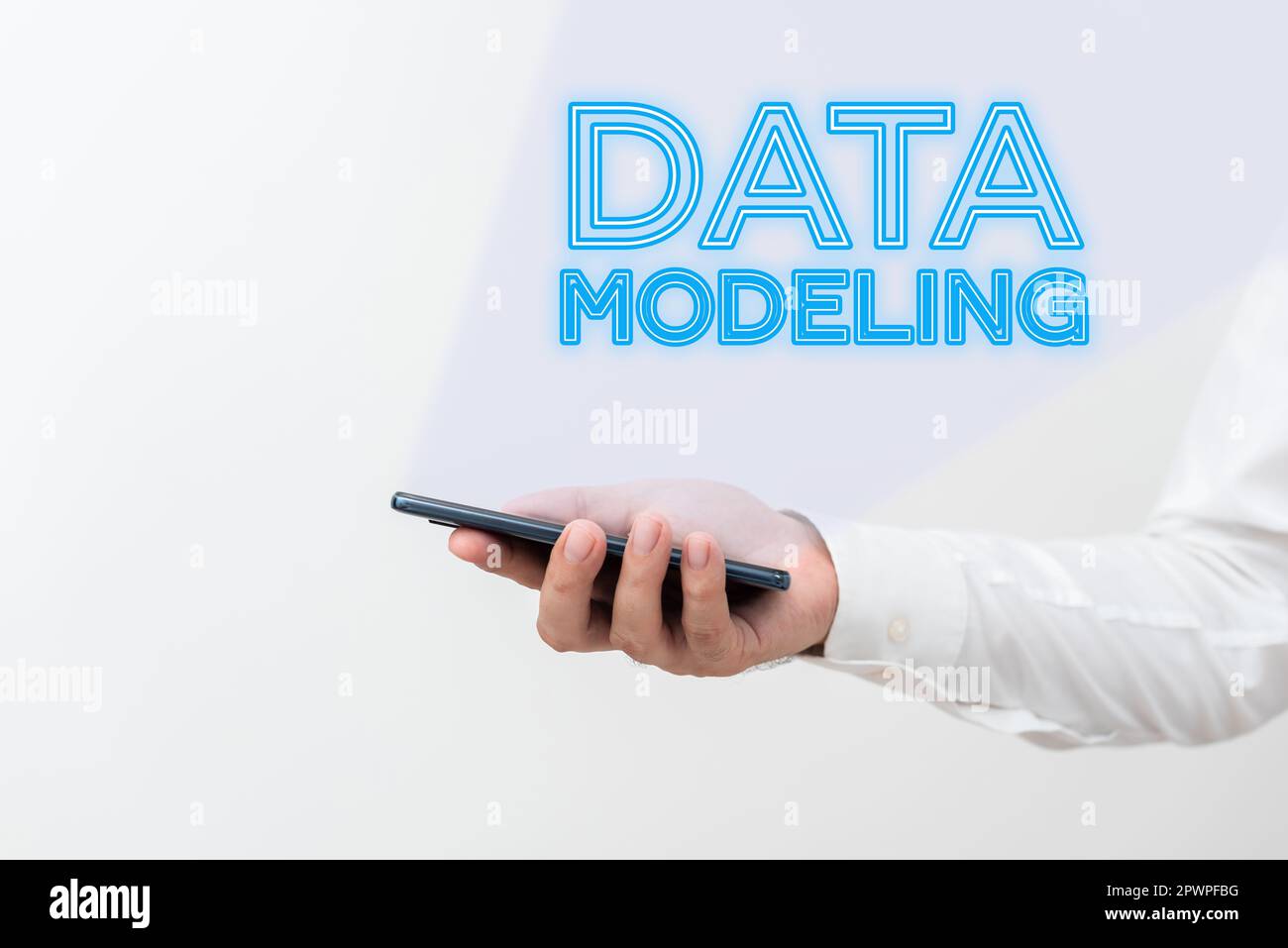 Text caption presenting Data Modeling, Business idea process of transferring data between data storage systems Stock Photo