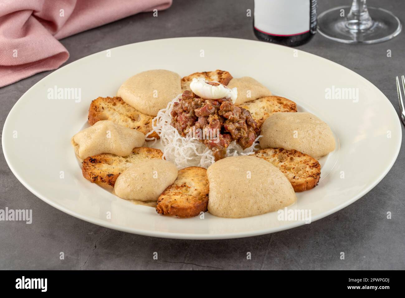 Veal tartare on stone table in fine dining restaurant Stock Photo Alamy
