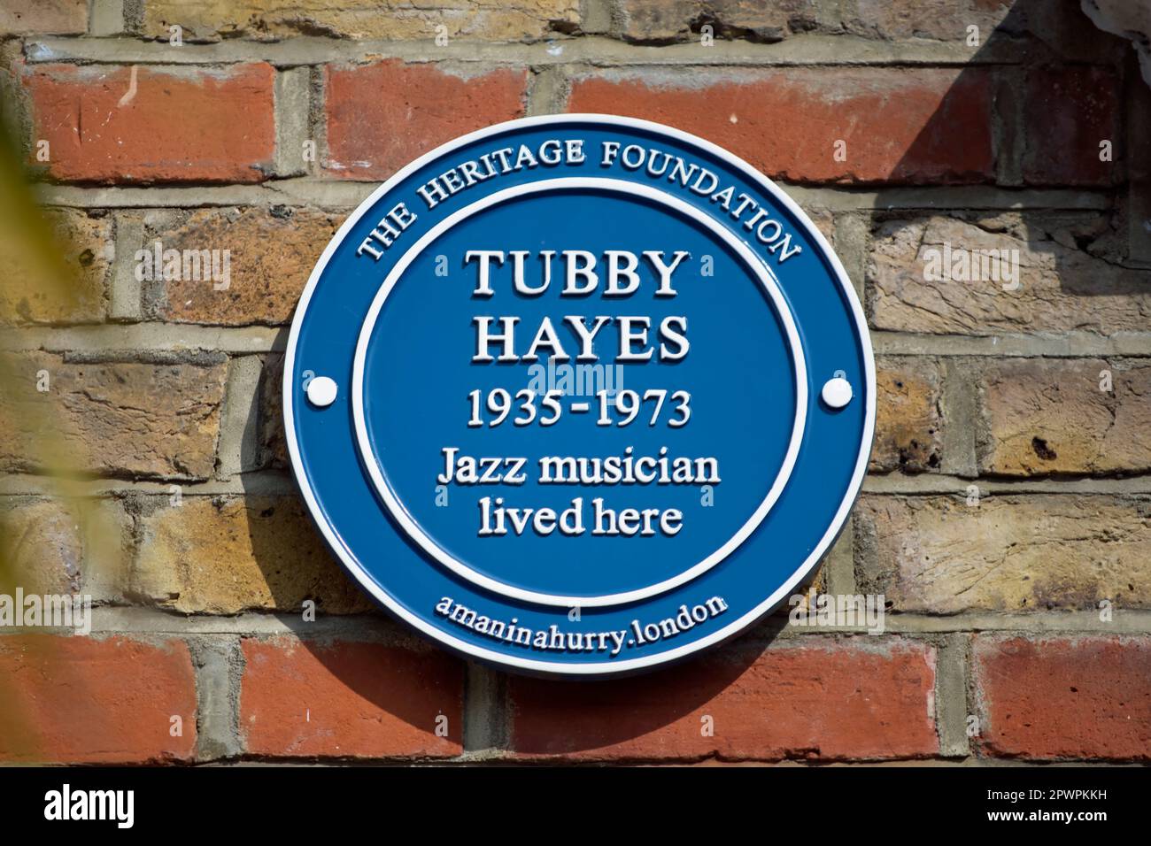 a heritage foundation blue plaque marking a home of jazz musician tubby hayes, raynes park, southwest london, england Stock Photo