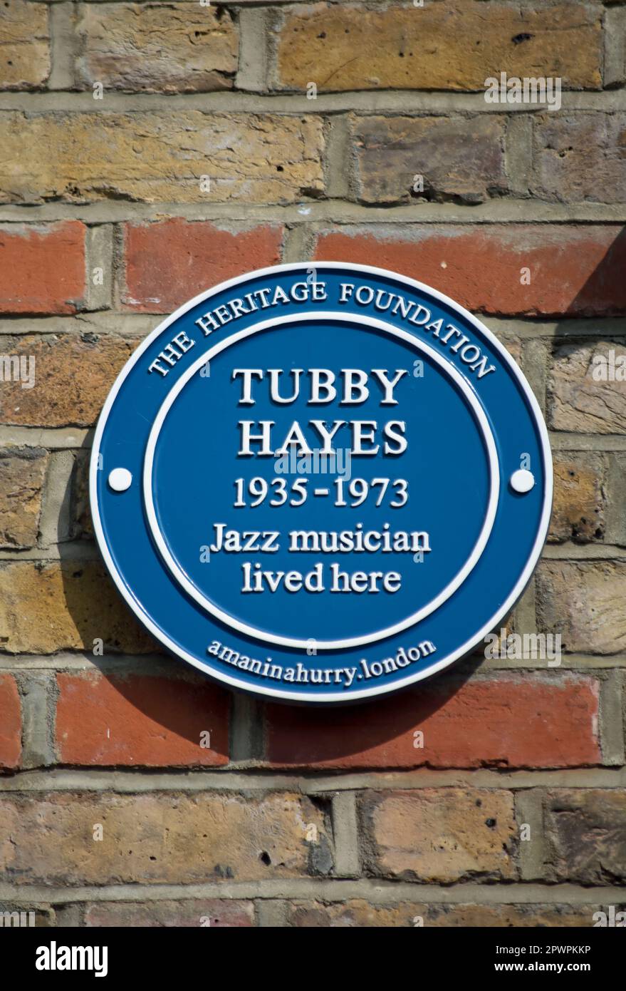 a heritage foundation blue plaque marking a home of jazz musician tubby hayes, raynes park, southwest london, england Stock Photo