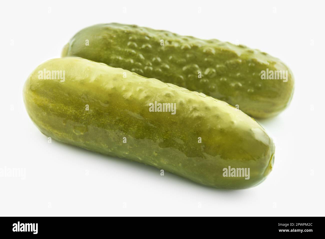 2 pickled cucumbers pickles close up Stock Photo